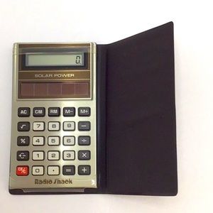 👠 Vintage Radio Shack Solar Calculator with brown case